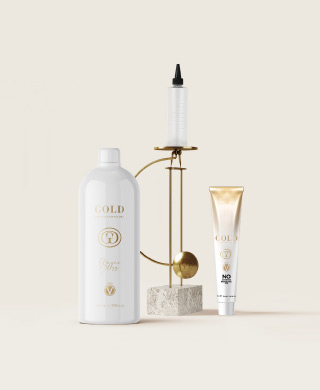 GOLD Professional Premium Hair Colors und Magic Gloss auf hellem Hintergrund.